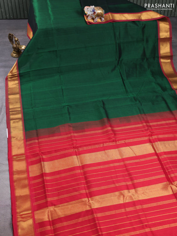 Silk cotton saree bottle green and maroon with plain body and zari woven border