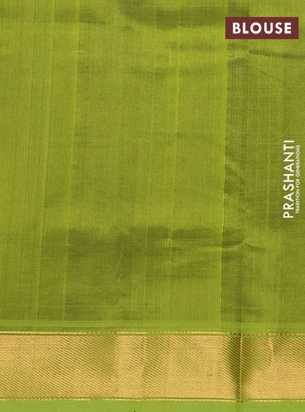Silk cotton saree deep wine and light green with plain body and zari woven border