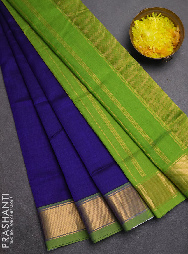 Silk cotton saree blue and light green with plain body and zari woven border