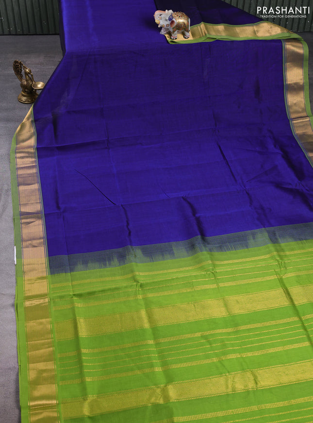 Silk cotton saree blue and light green with plain body and zari woven border