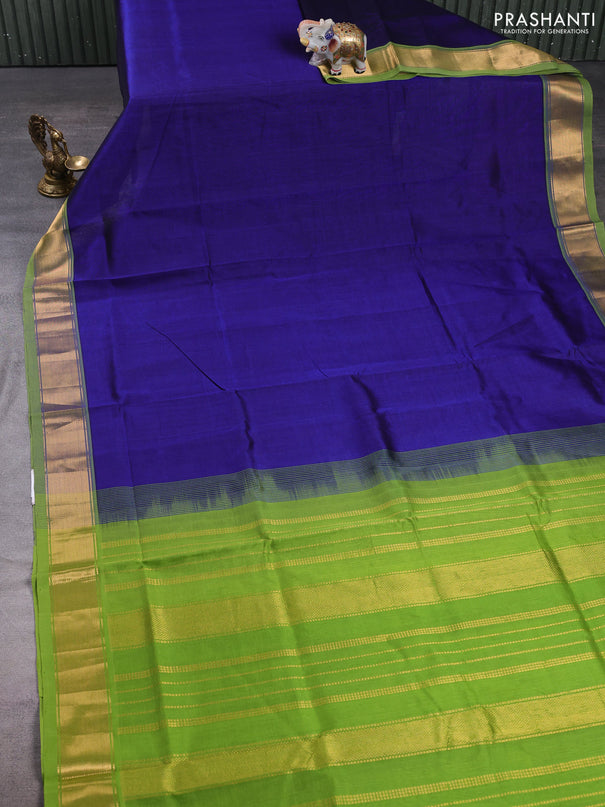 Silk cotton saree blue and light green with plain body and zari woven border