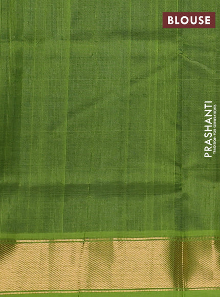 Silk cotton saree blue and light green with plain body and zari woven border