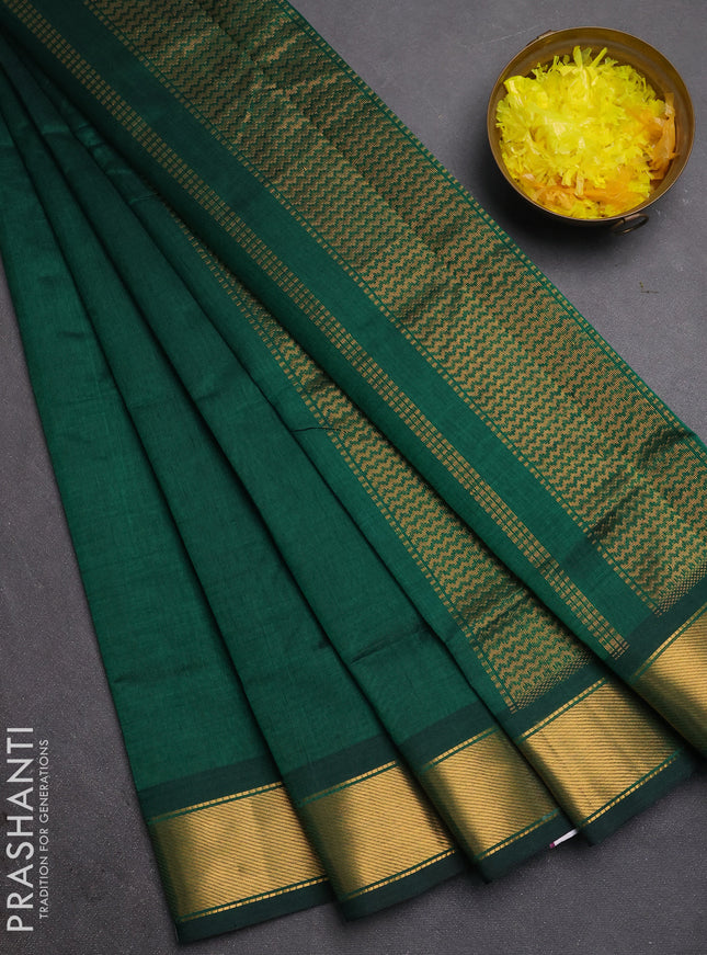 Silk cotton saree bottle green with plain body and zari woven border