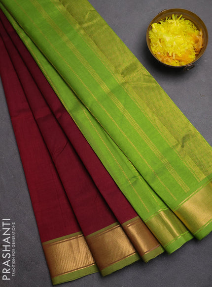 Silk cotton saree deep maroon and light green with plain body and zari woven border