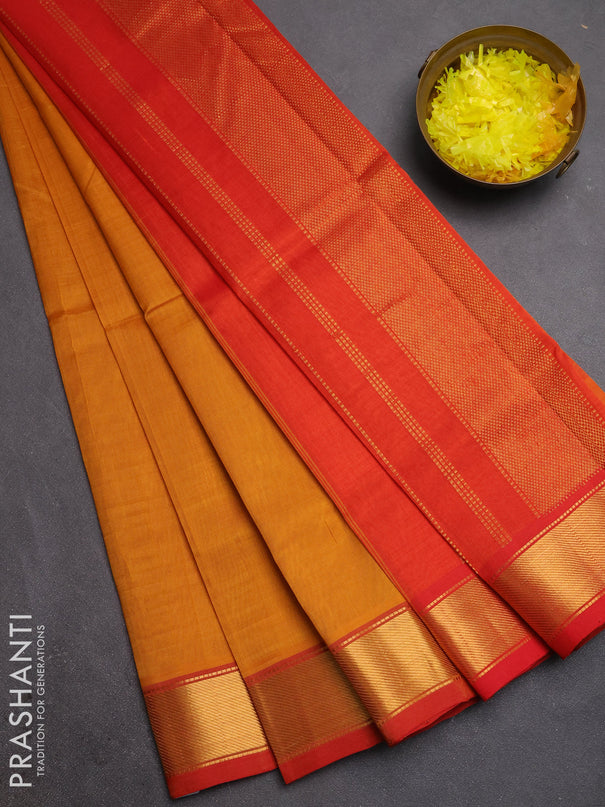Silk cotton saree mustard yellow and red with plain body and zari woven border