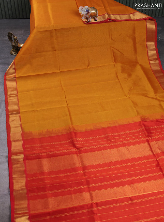 Silk cotton saree mustard yellow and red with plain body and zari woven border