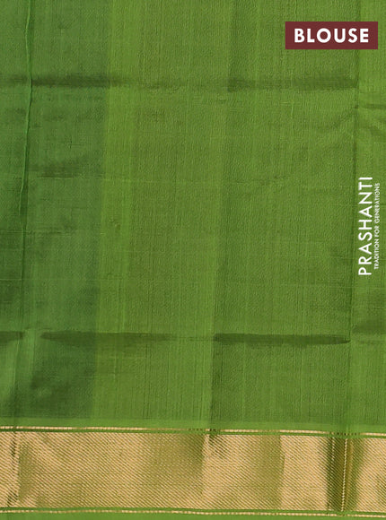 Silk cotton saree wine shade and light green with plain body and zari woven border