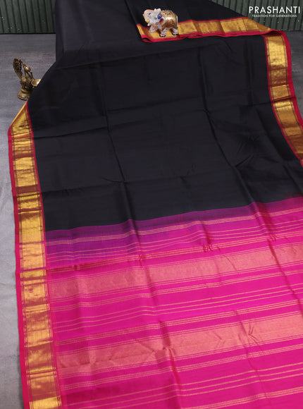 Silk cotton saree black and pink with plain body and zari woven border
