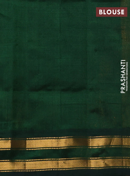 Silk cotton saree mustard yellow and bottle green with plain body and zari woven border