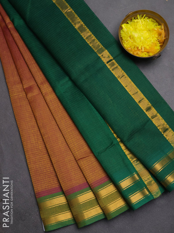 Silk cotton saree dual shade of dark mustard and green with plain body and zari woven border