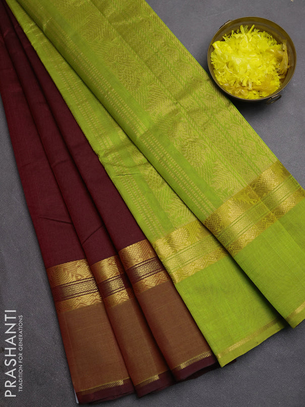 Silk cotton saree deep maroon and light green with plain body and rettapet zari woven border