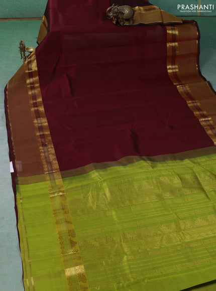 Silk cotton saree deep maroon and light green with plain body and rettapet zari woven border