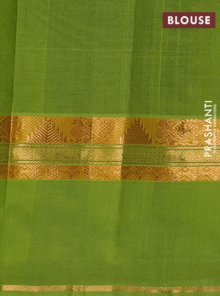 Silk cotton saree royal blue and light green with plain body and rettapet zari woven border