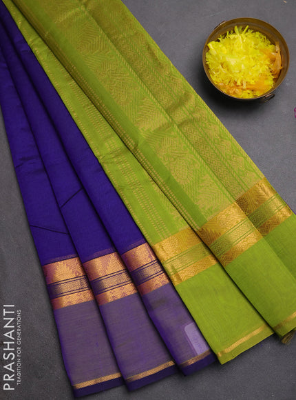 Silk cotton saree royal blue and light green with plain body and rettapet zari woven border