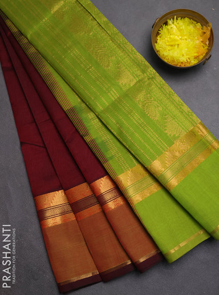 Silk cotton saree deep wine and light green with plain body and rettapet zari woven border