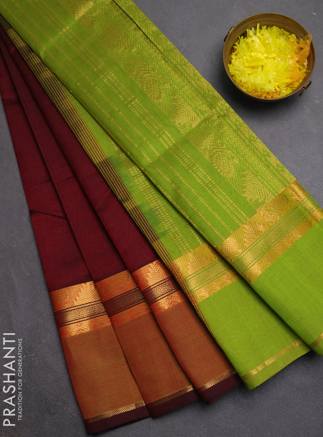 Silk cotton saree deep wine and light green with plain body and rettapet zari woven border