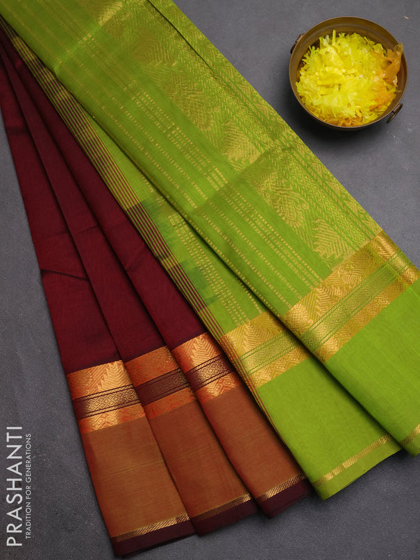 Silk cotton saree deep wine and light green with plain body and rettapet zari woven border