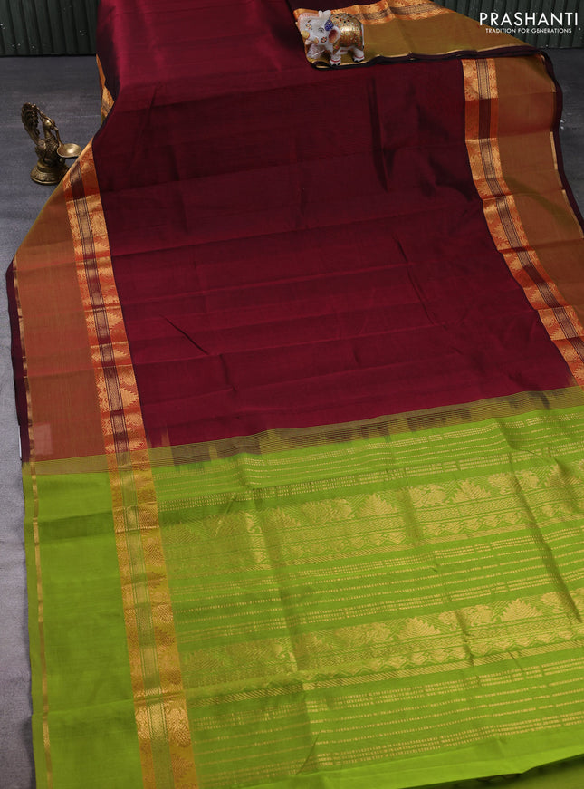 Silk cotton saree deep wine and light green with plain body and rettapet zari woven border