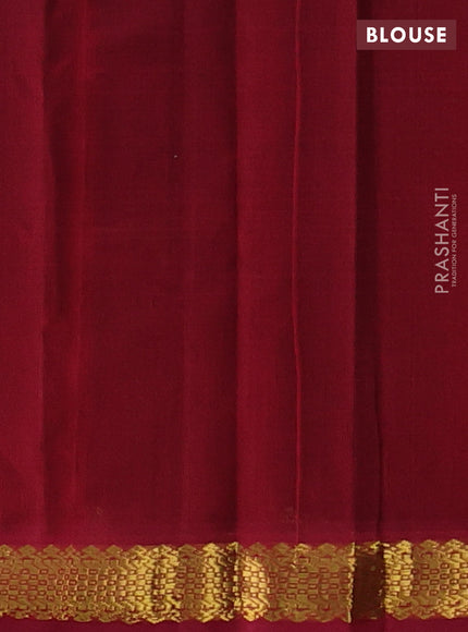 Silk cotton saree black and maroon with plain body and zari woven border