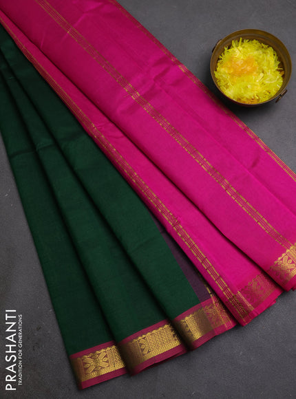 Silk cotton saree bottle green and pink with plain body and zari woven border