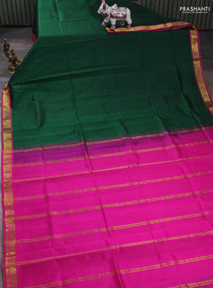 Silk cotton saree bottle green and pink with plain body and zari woven border
