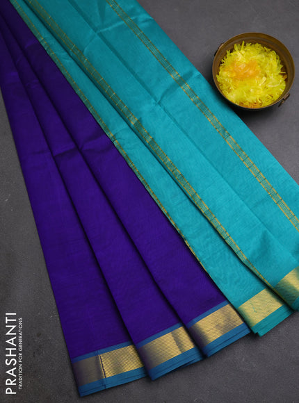 Silk cotton saree blue and teal green with plain body and zari woven border