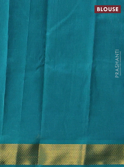 Silk cotton saree blue and teal green with plain body and zari woven border