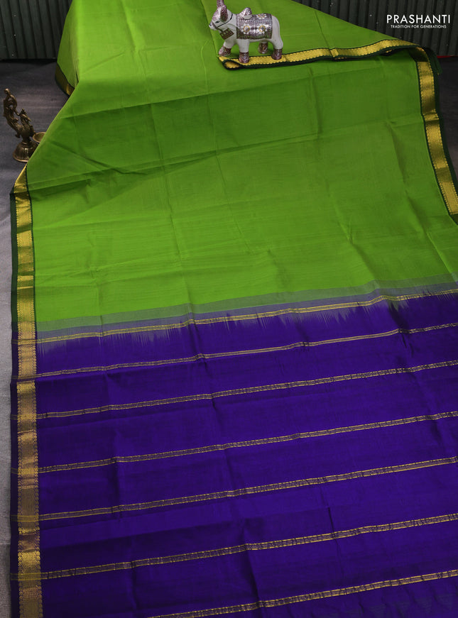 Silk cotton saree parrot green and blue with plain body and zari woven border