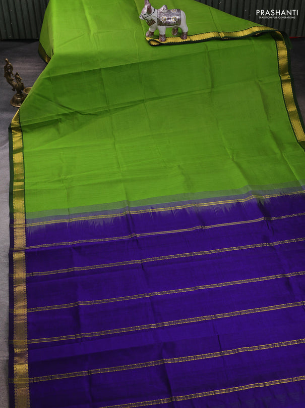 Silk cotton saree parrot green and blue with plain body and zari woven border