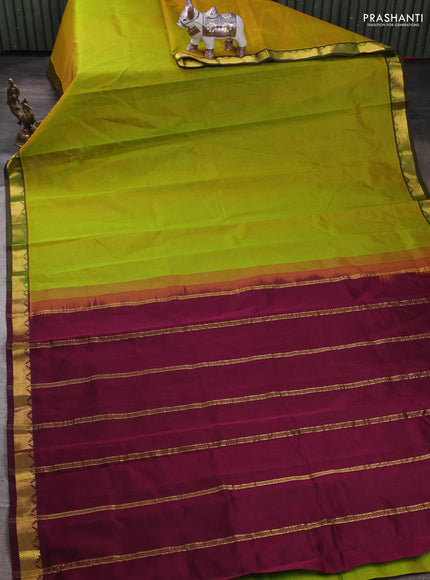 Silk cotton saree mustard green and wine shade with plain body and zari woven border