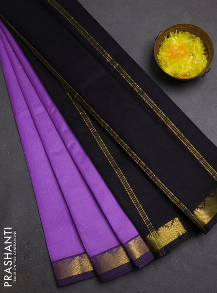 Silk cotton saree lavender and black with plain body and zari woven border
