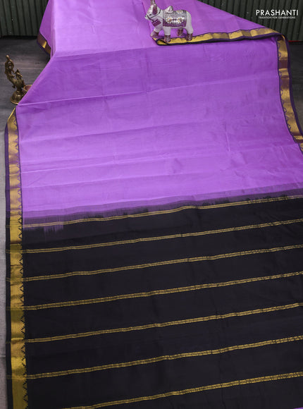 Silk cotton saree lavender and black with plain body and zari woven border