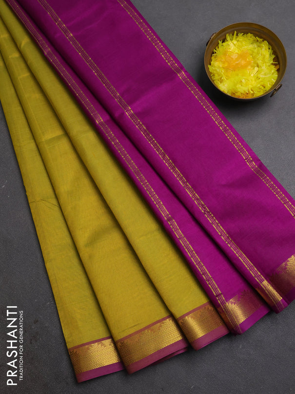 Silk cotton saree mustrad green and purple with plain body and zari woven border