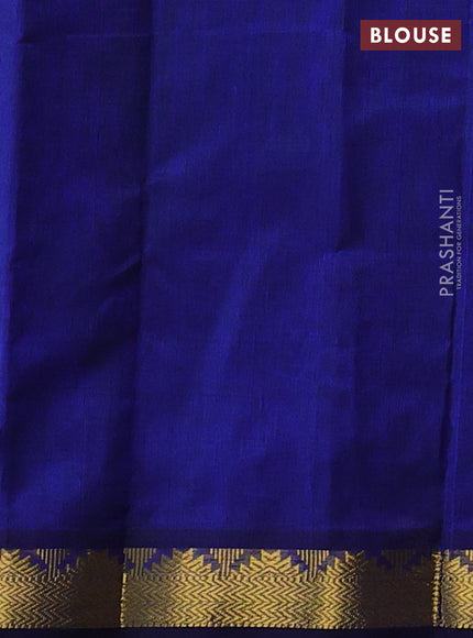 Silk cotton saree dual shade of bluish green and blue with plain body and zari woven border