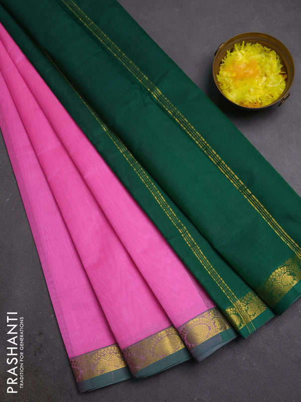 Silk cotton saree light pink and green with plain body and zari woven border