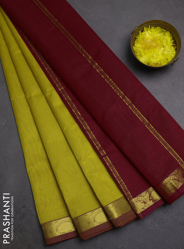 Silk cotton saree mustard yellow and kumkum red with plain body and zari woven border