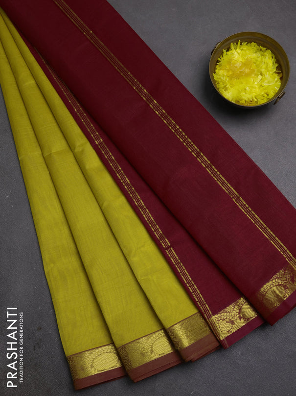 Silk cotton saree mustard yellow and kumkum red with plain body and zari woven border