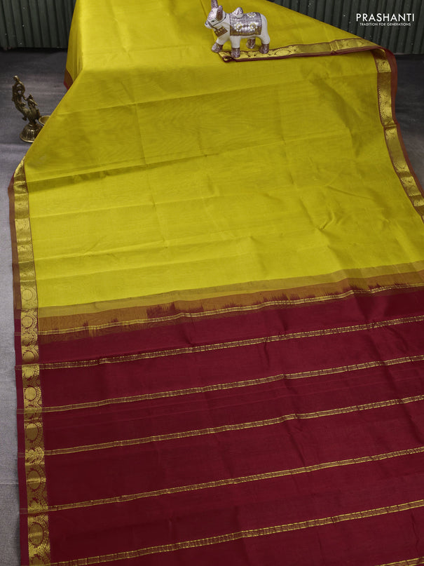 Silk cotton saree mustard yellow and kumkum red with plain body and zari woven border
