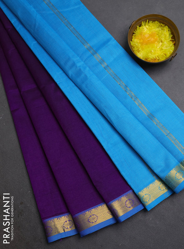 Silk cotton saree purple and cs blue with plain body and zari woven border
