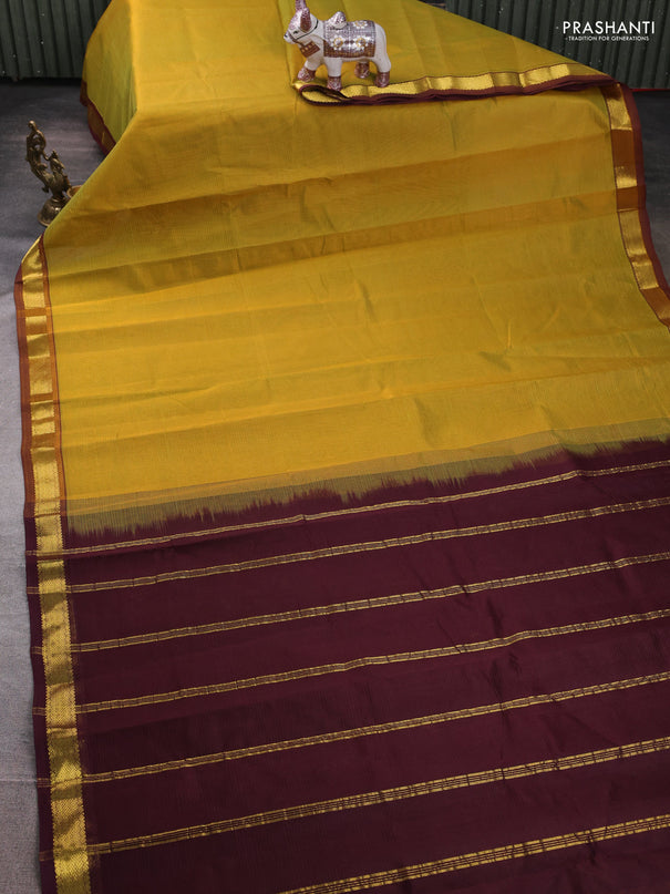 Silk cotton saree dual shade of mustard green and wine shade with allover stripe pattern and zari woven border