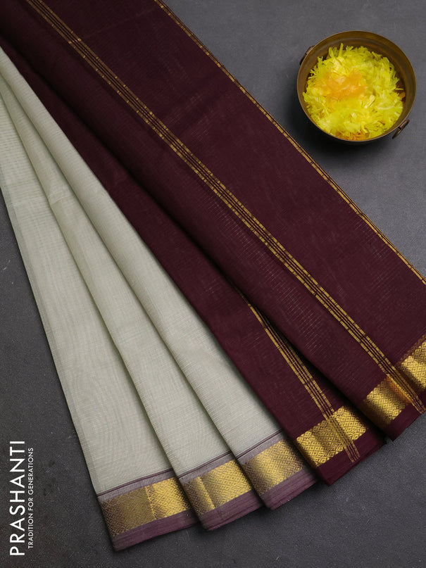 Silk cotton saree beige and wine shade with allover stripe pattern and zari woven border