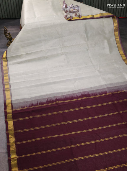 Silk cotton saree beige and wine shade with allover stripe pattern and zari woven border