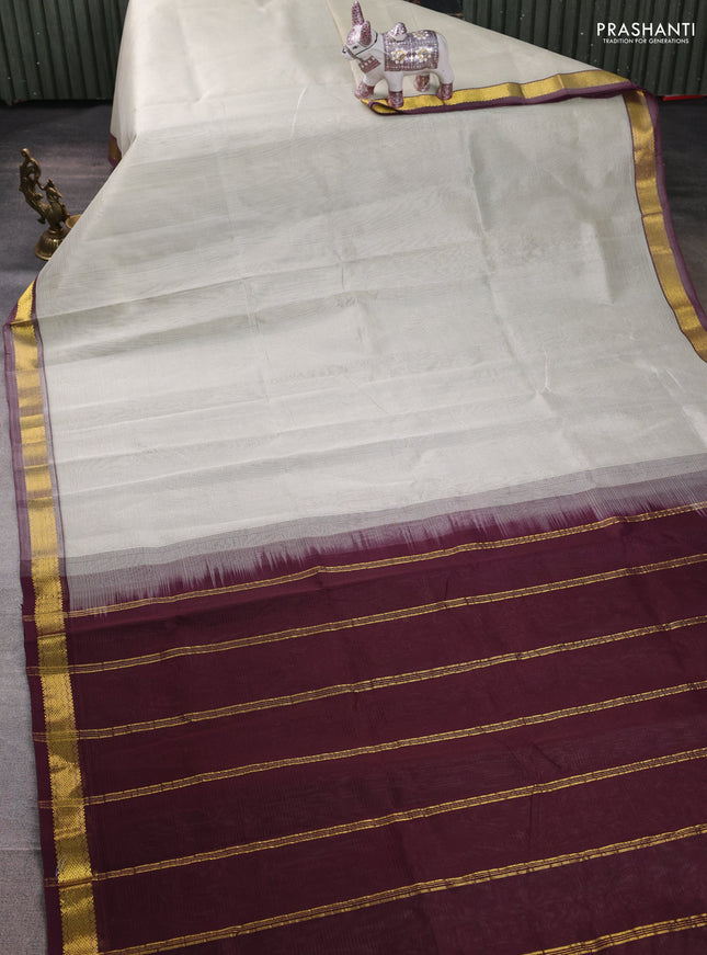 Silk cotton saree beige and wine shade with allover stripe pattern and zari woven border
