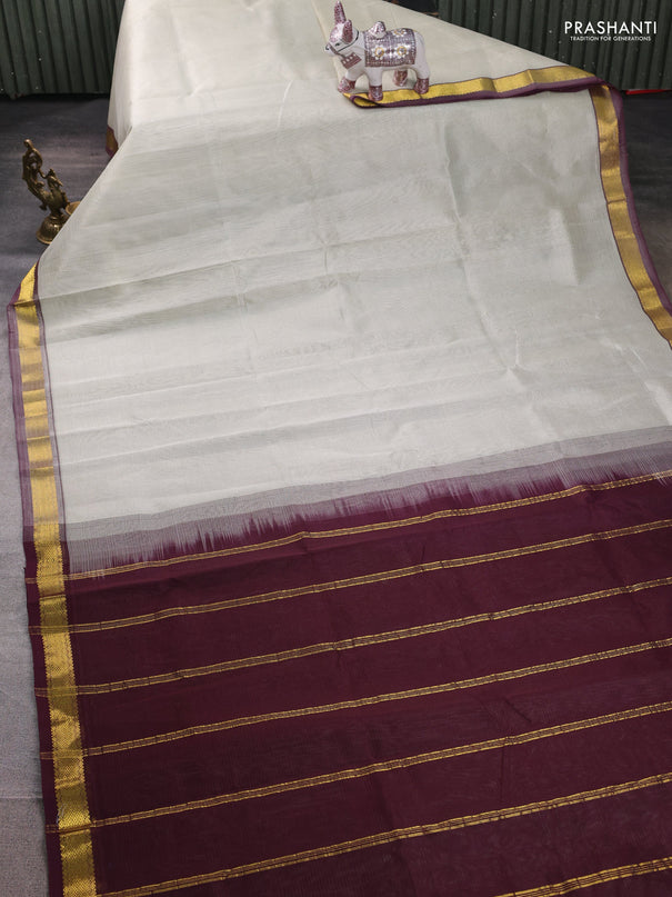 Silk cotton saree beige and wine shade with allover stripe pattern and zari woven border