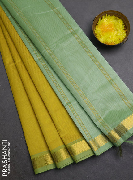 Silk cotton saree lime yellow and pista green with allover stripe pattern and zari woven border