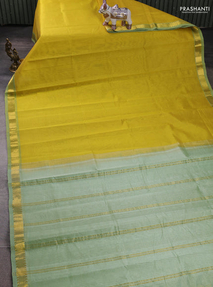 Silk cotton saree lime yellow and pista green with allover stripe pattern and zari woven border
