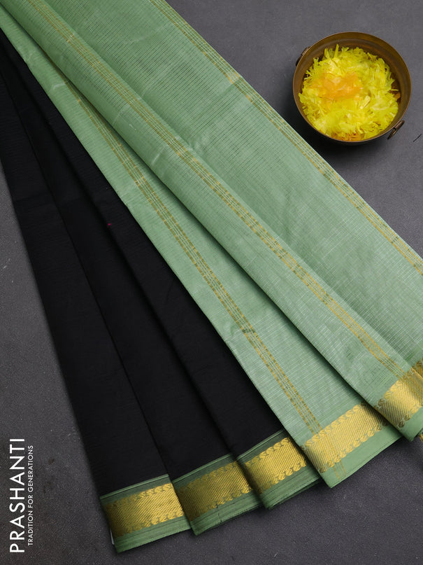 Silk cotton saree black and pista green with allover stripe pattern and zari woven border