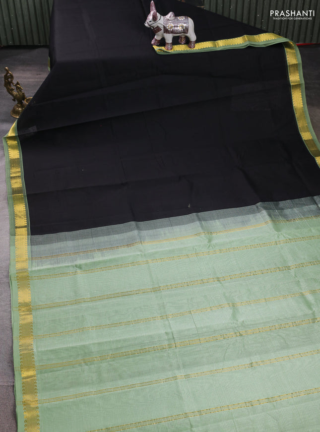 Silk cotton saree black and pista green with allover stripe pattern and zari woven border