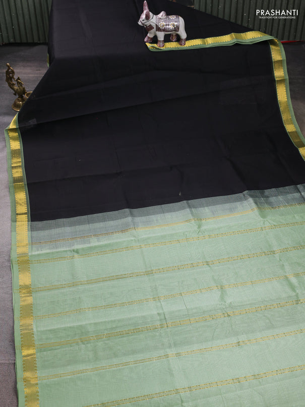 Silk cotton saree black and pista green with allover stripe pattern and zari woven border