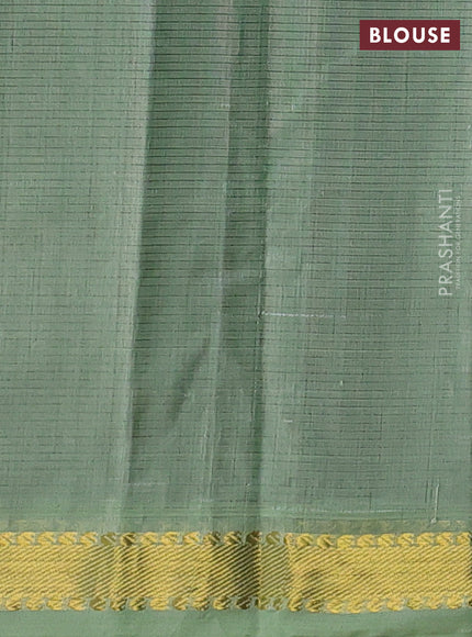 Silk cotton saree black and pista green with allover stripe pattern and zari woven border